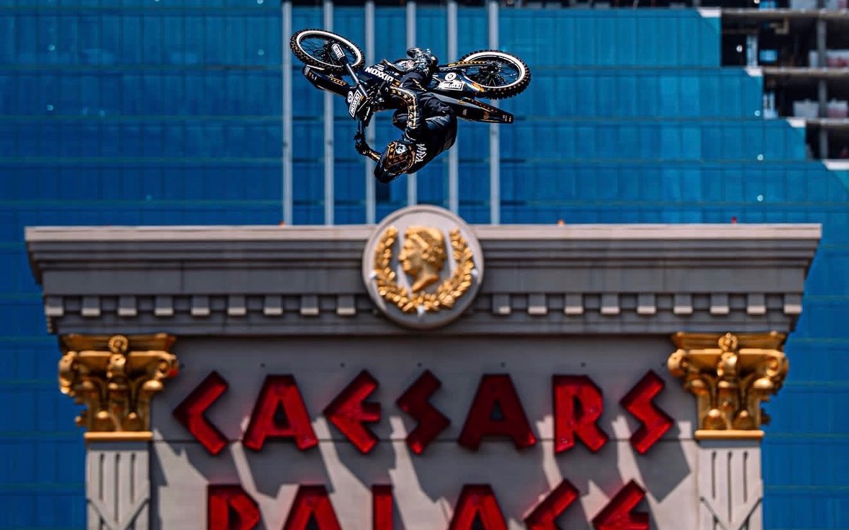 Colby Raha soaring over the Caesars Palace sign